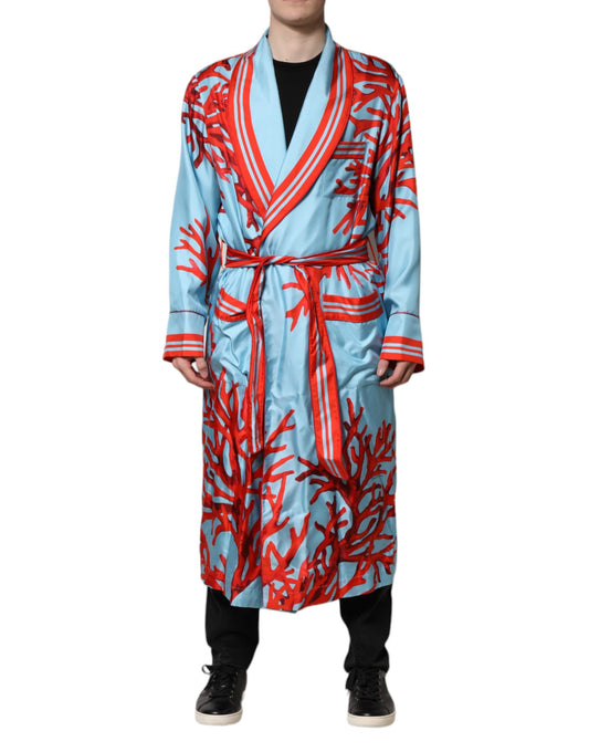 Man wearing blue robe with red design