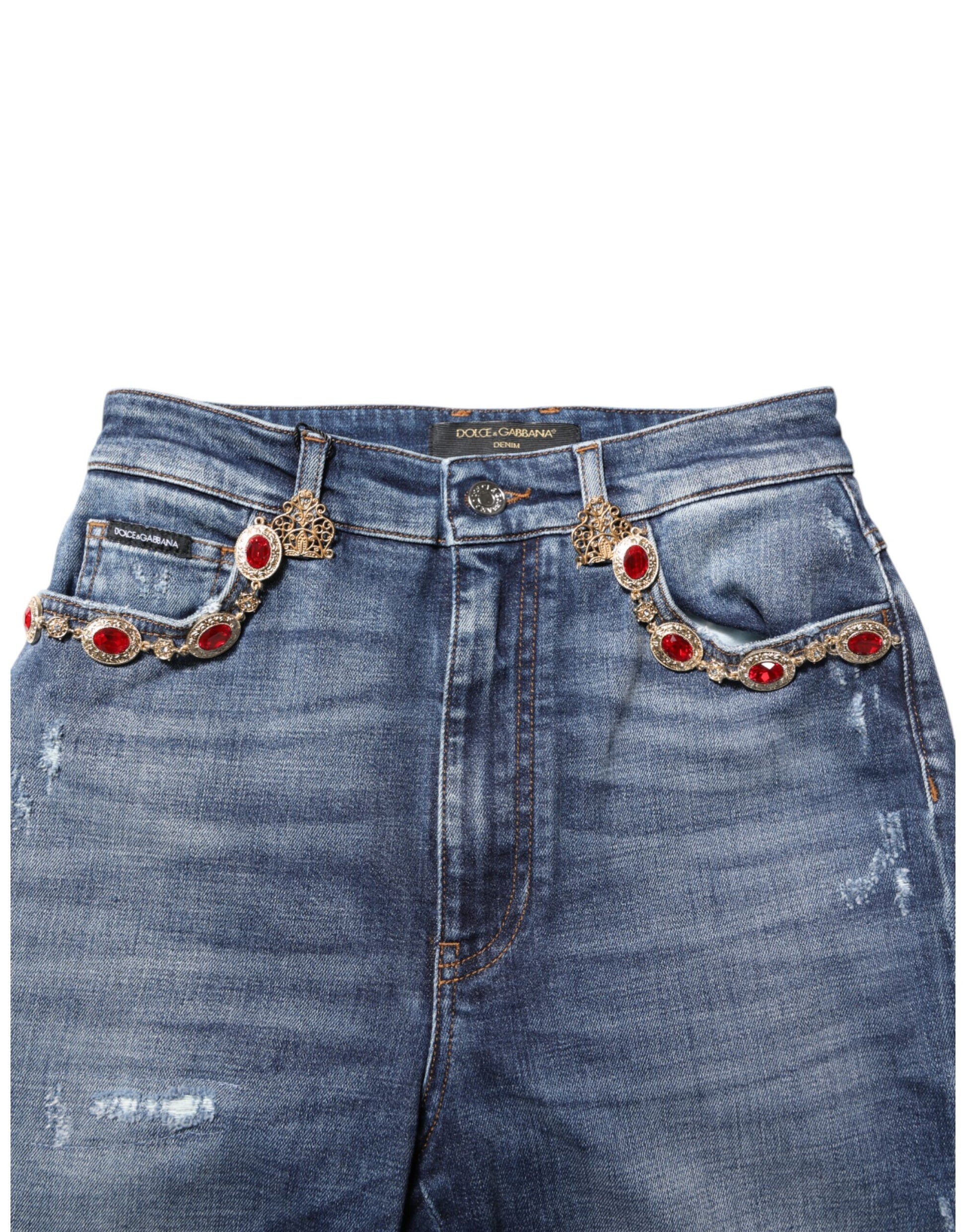 Pair of blue denim jeans with red embellishments on pockets
