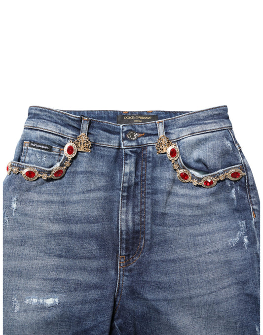 Pair of blue denim jeans with red embellishments on pockets