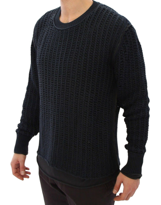 Man wearing black knit sweater