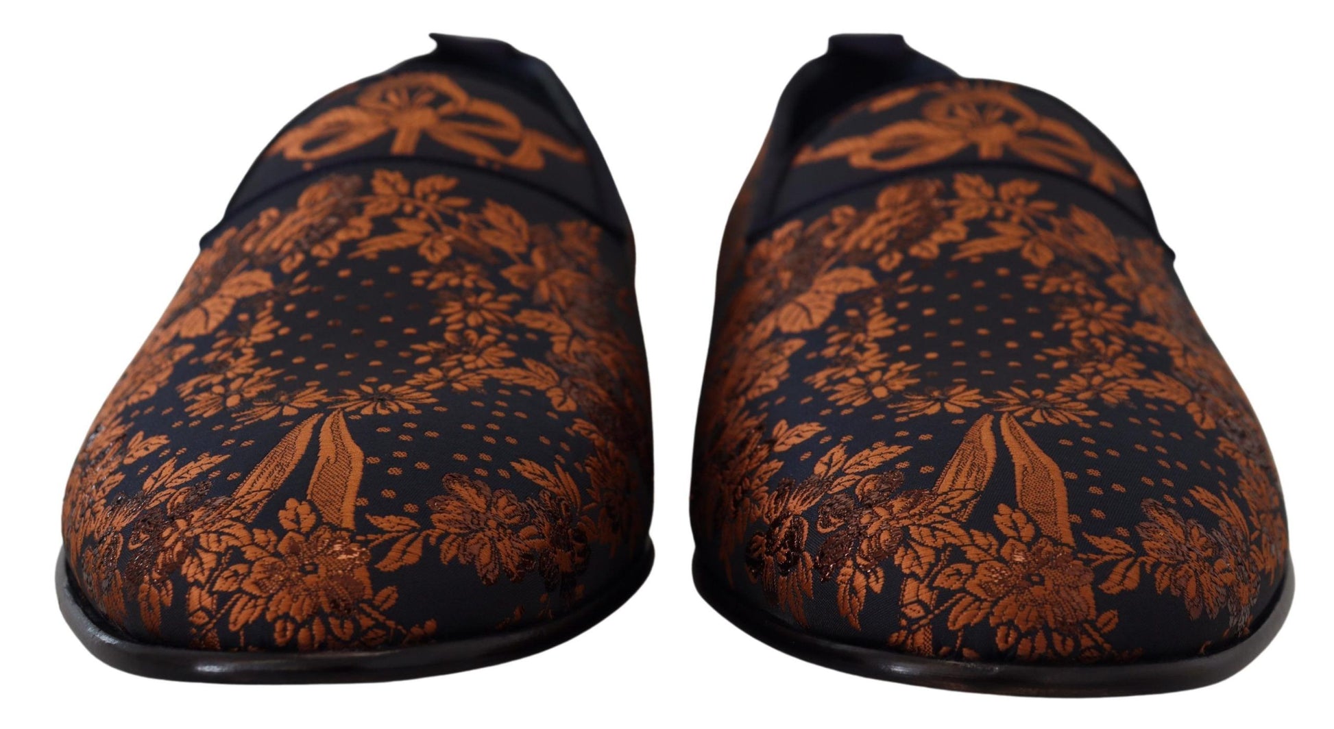 Pair of black and orange shoes with floral pattern