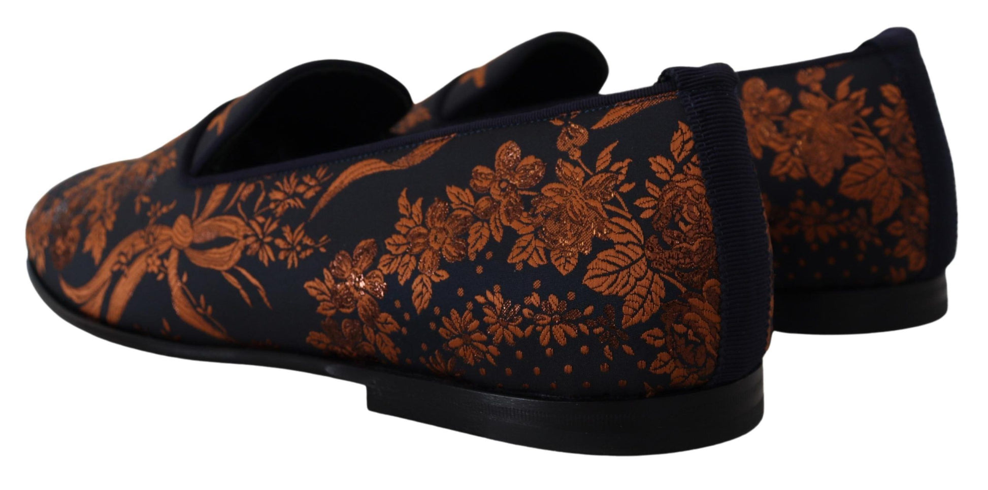 Pair of black and orange patterned shoes with laces