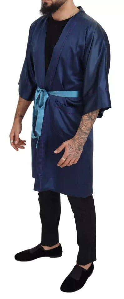 Man wearing blue robe with belt tied around waist