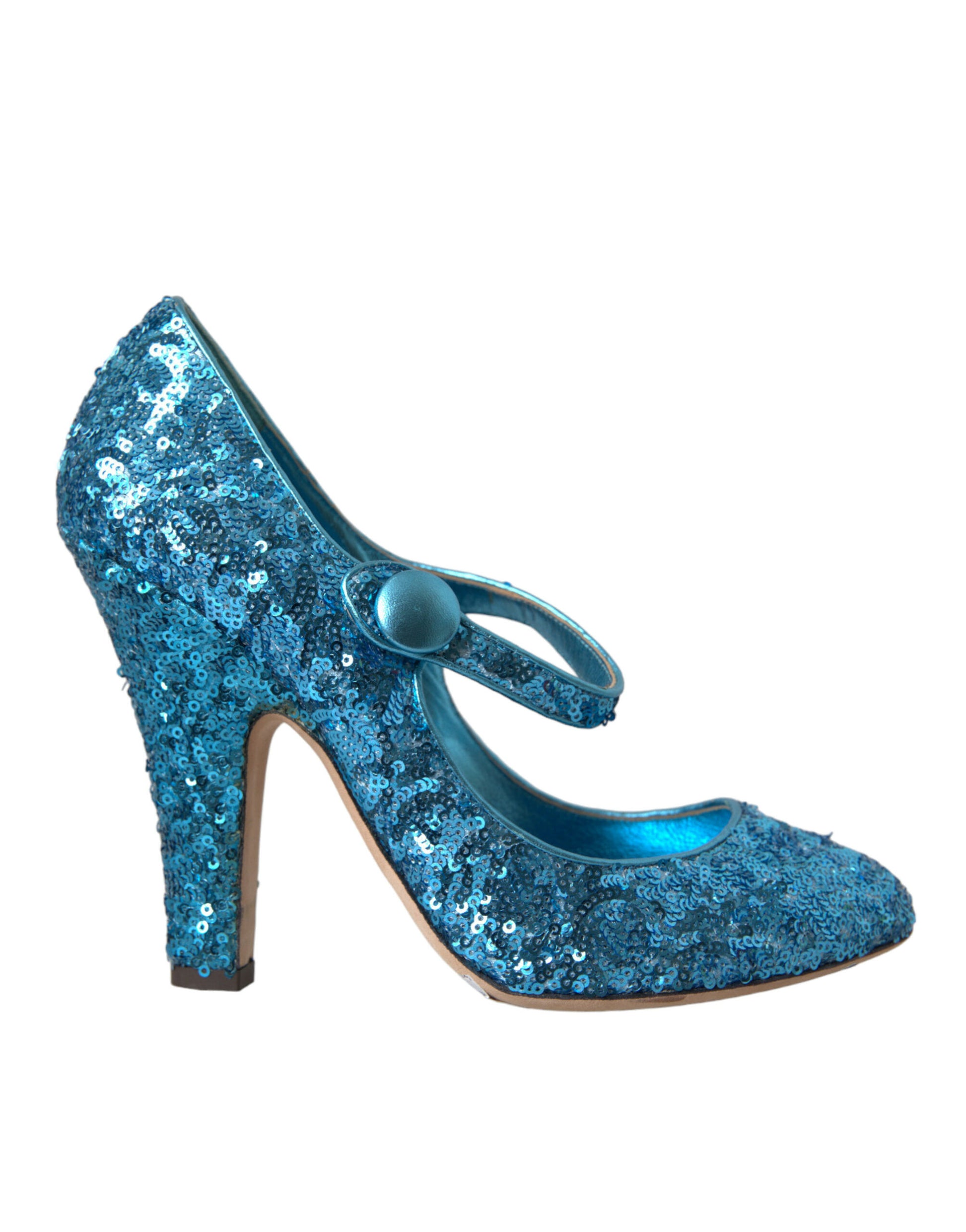 Blue glittery high heel shoes with a bow on top