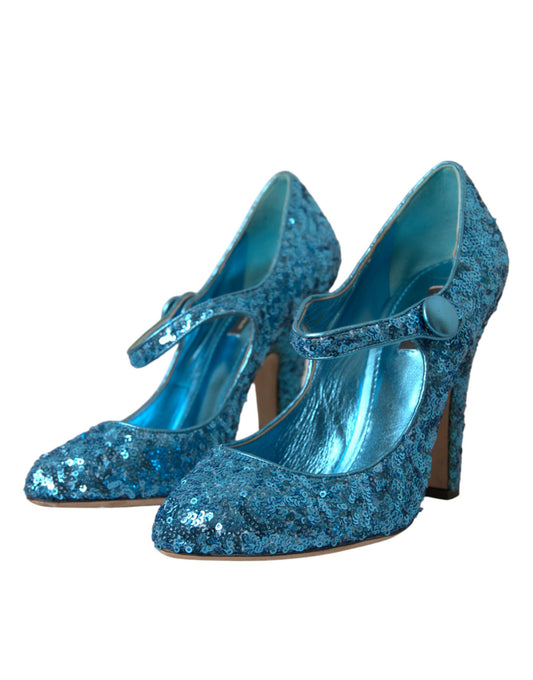 Pair of blue glittery high heel shoes with strap detailing