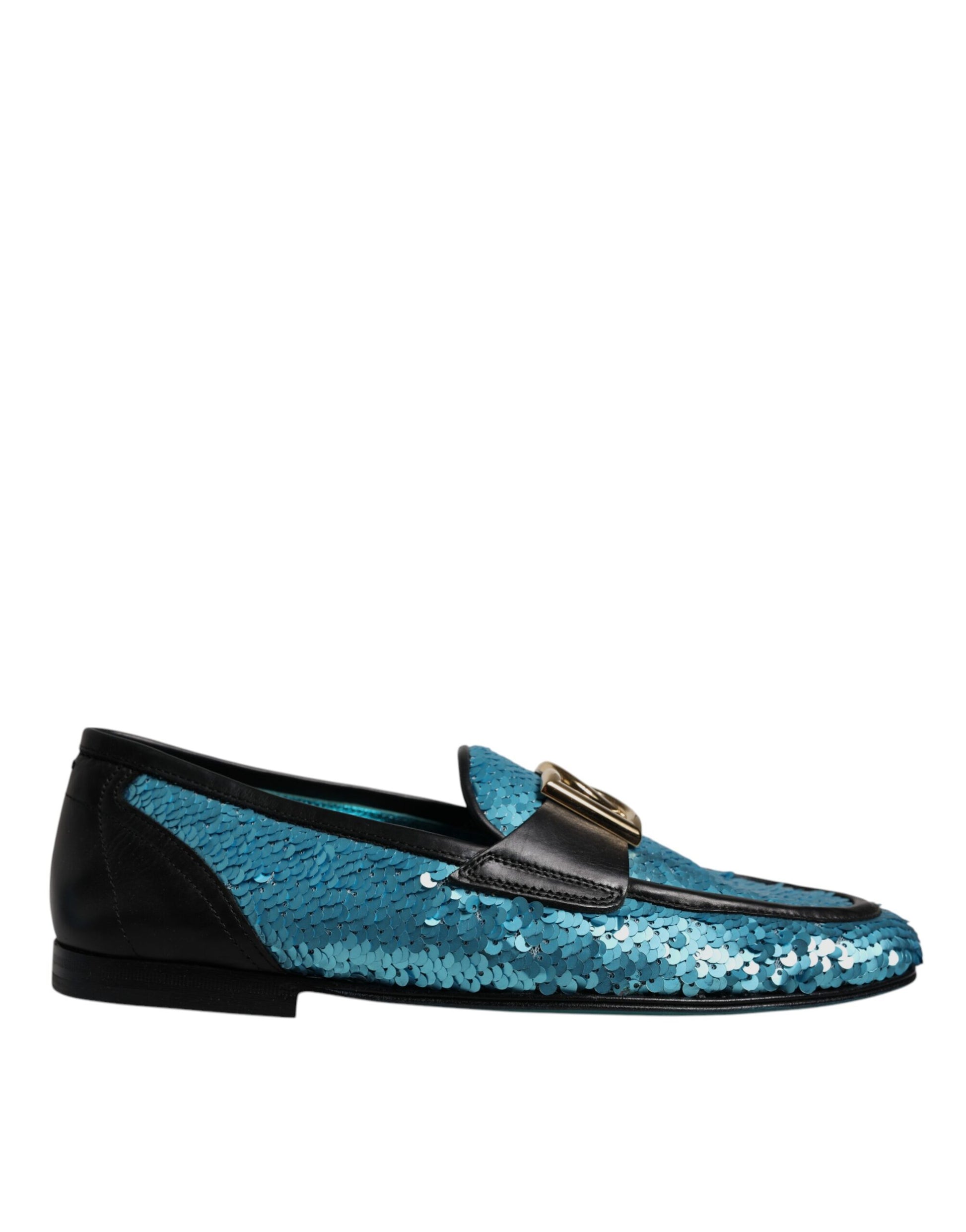 A pair of blue sequin loafers with gold buckle, designed by Dolce & Gabbana