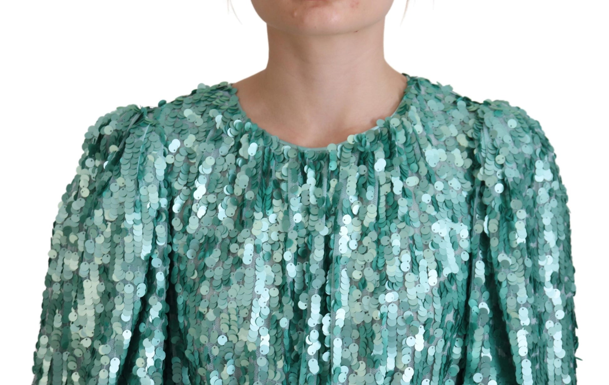 A green sequined midi dress with pleats and a round neckline