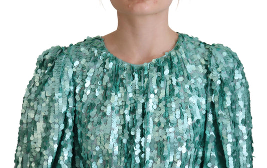 A green sequined midi dress with pleats and a round neckline