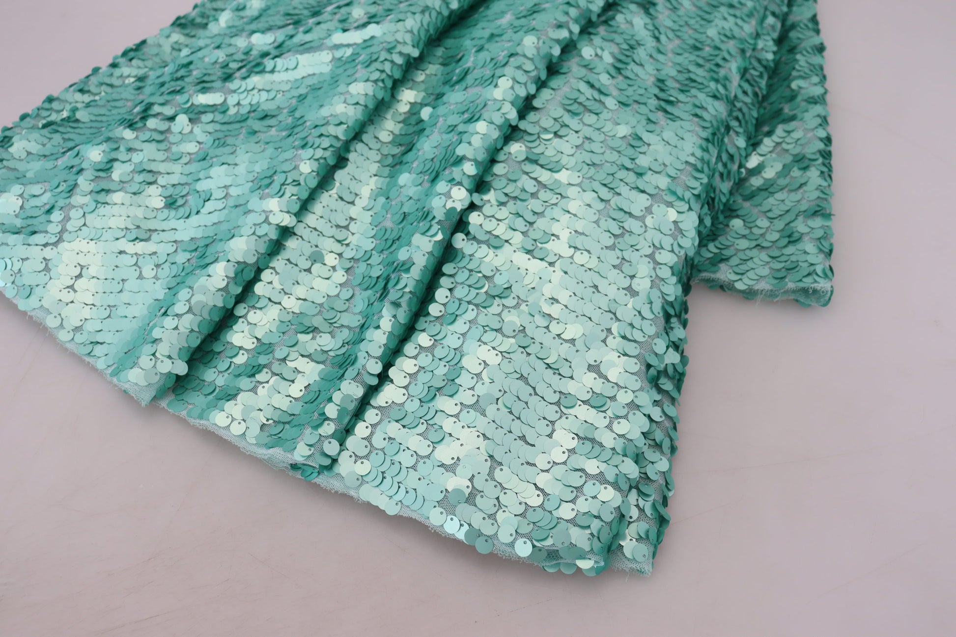 A blue sequined pleated aline midi nylon dress from Dolce & Gabbana