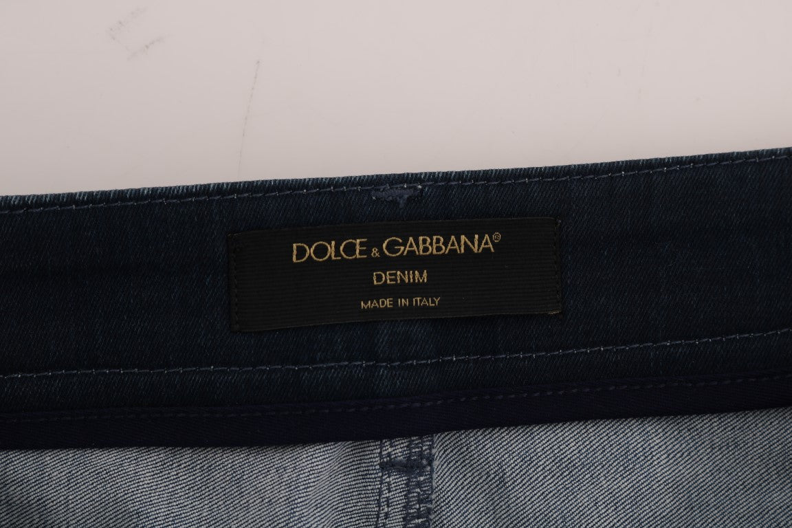 Blue denim jeans with brand label on waistband