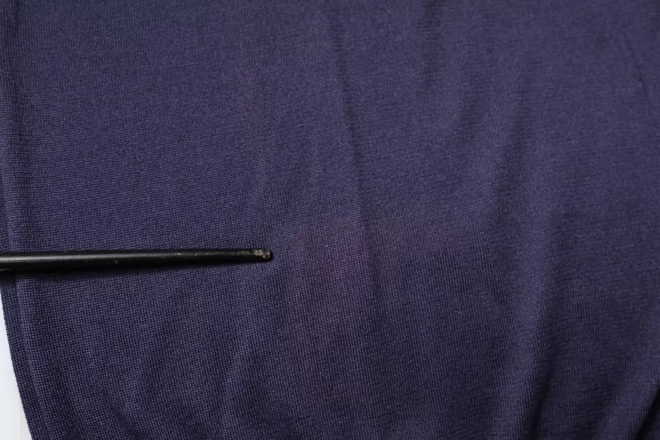 Black pen on blue fabric