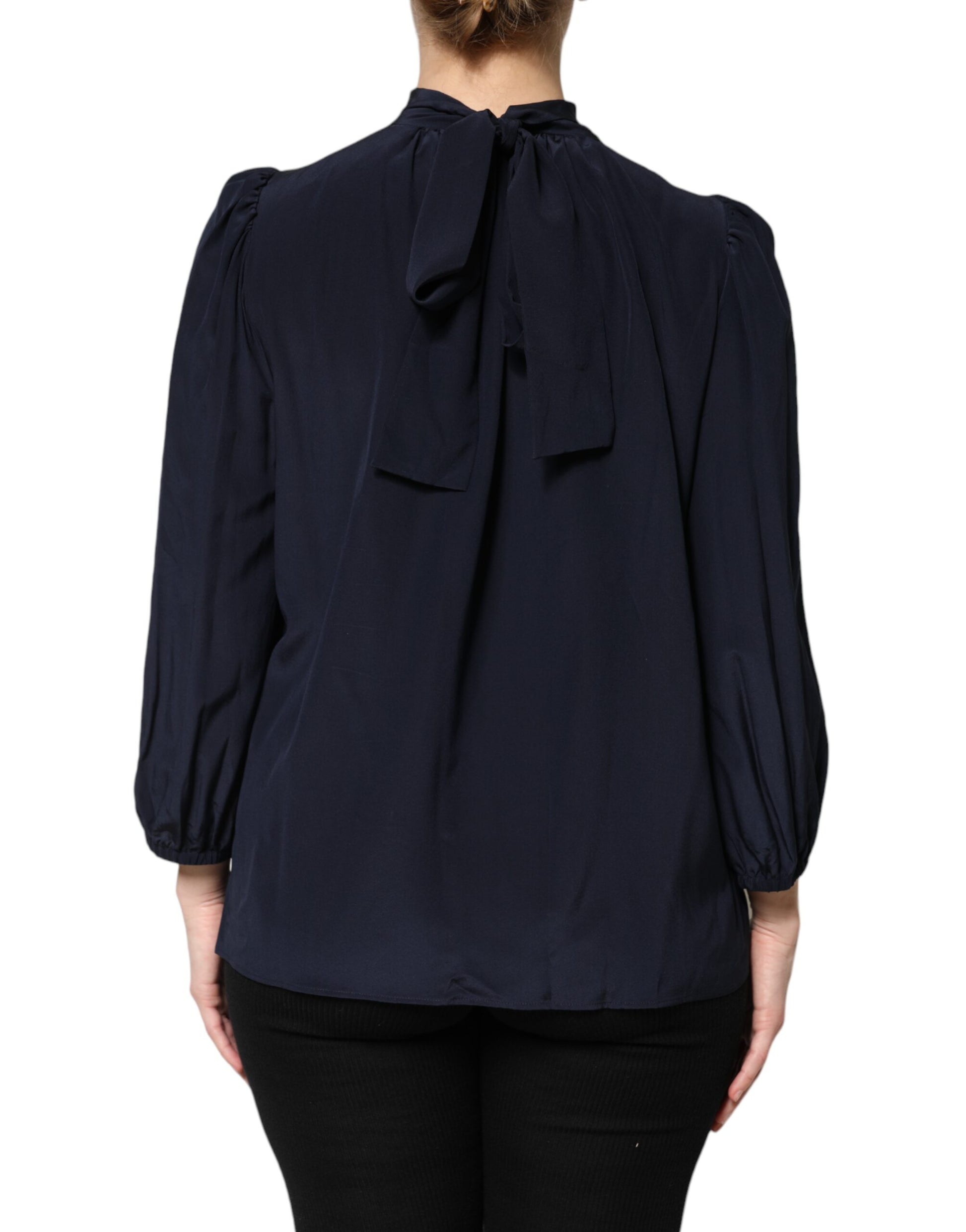 Blue shirt with ruffles on sleeves