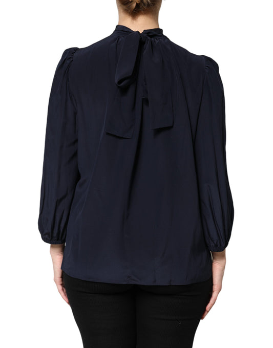 Blue shirt with ruffles on sleeves