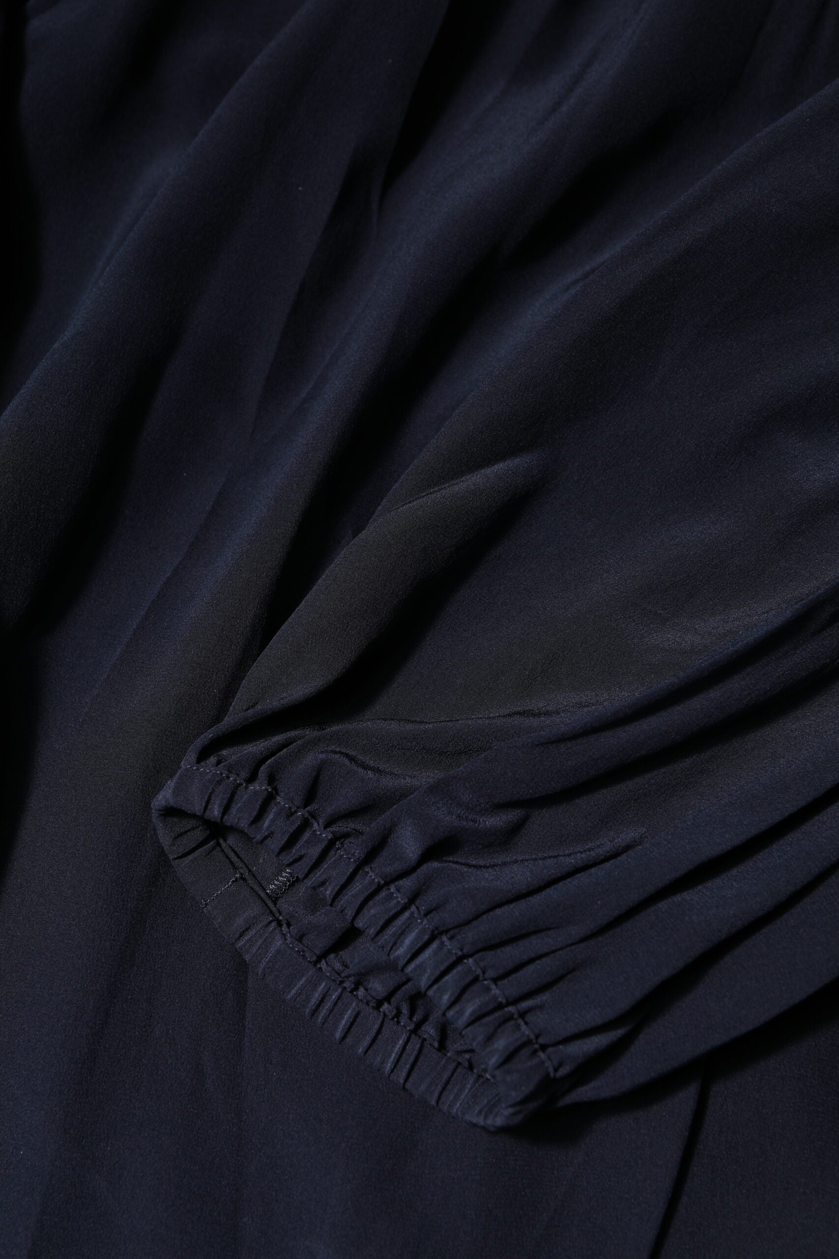 Dark blue scarf with fringe detailing