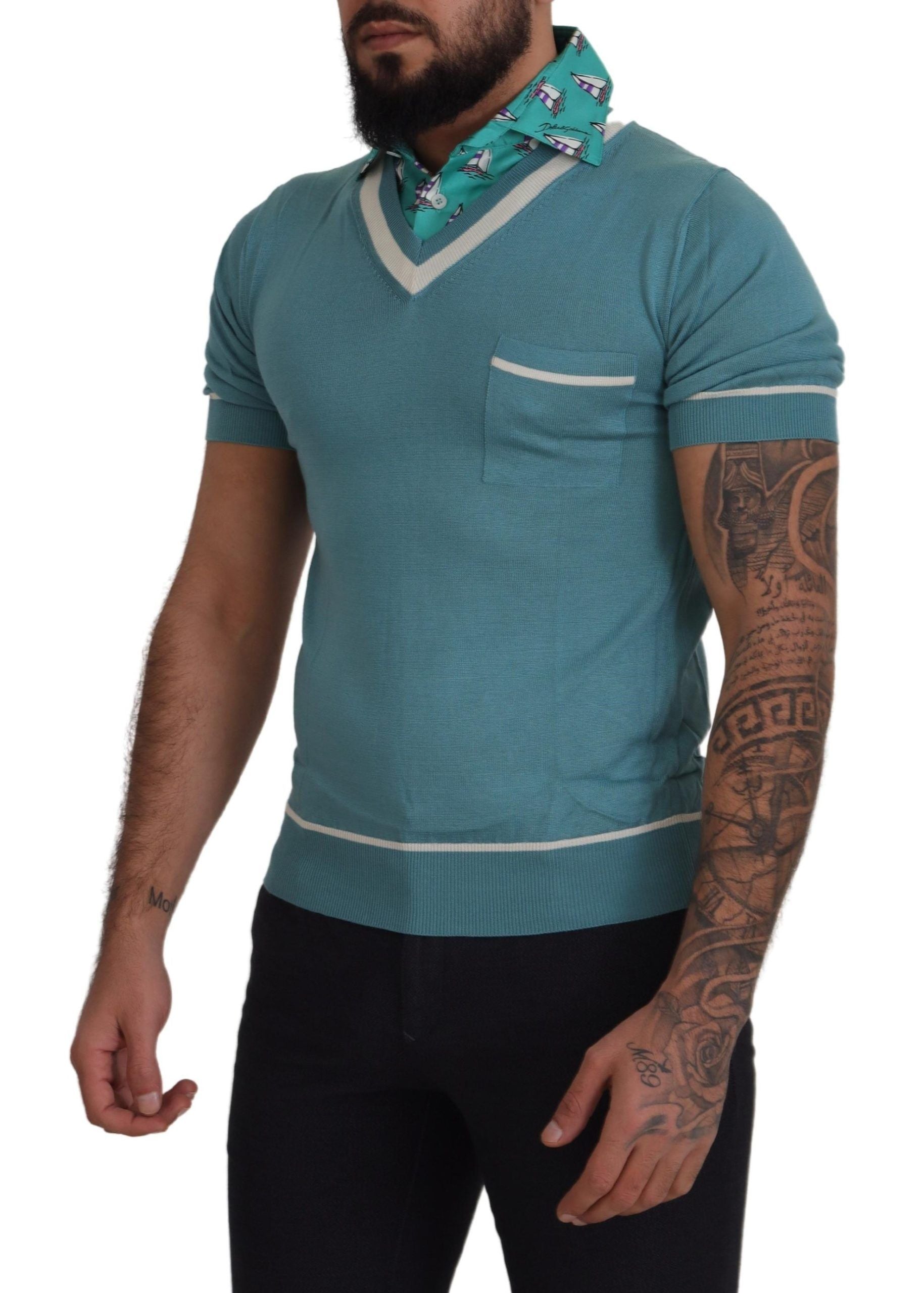 Man wearing blue sweater vest with white stripes