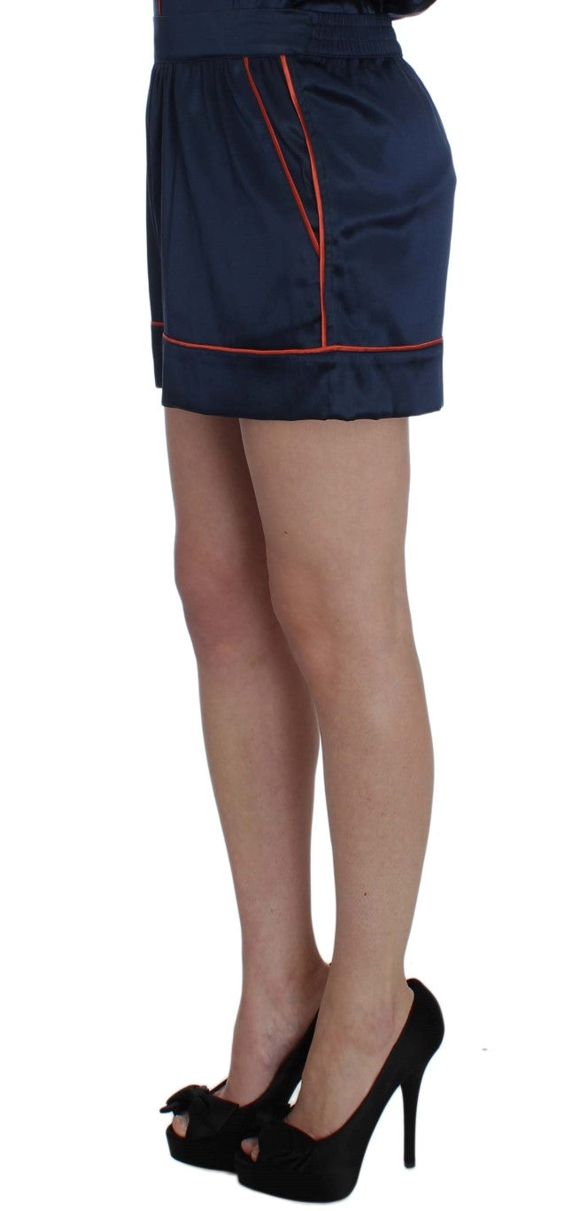 Blue shorts with red trim on a model