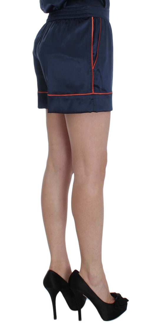 Blue shorts with red trim on a model