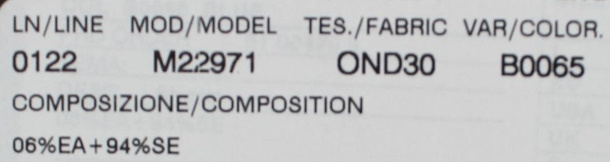 White label on fabric with black text