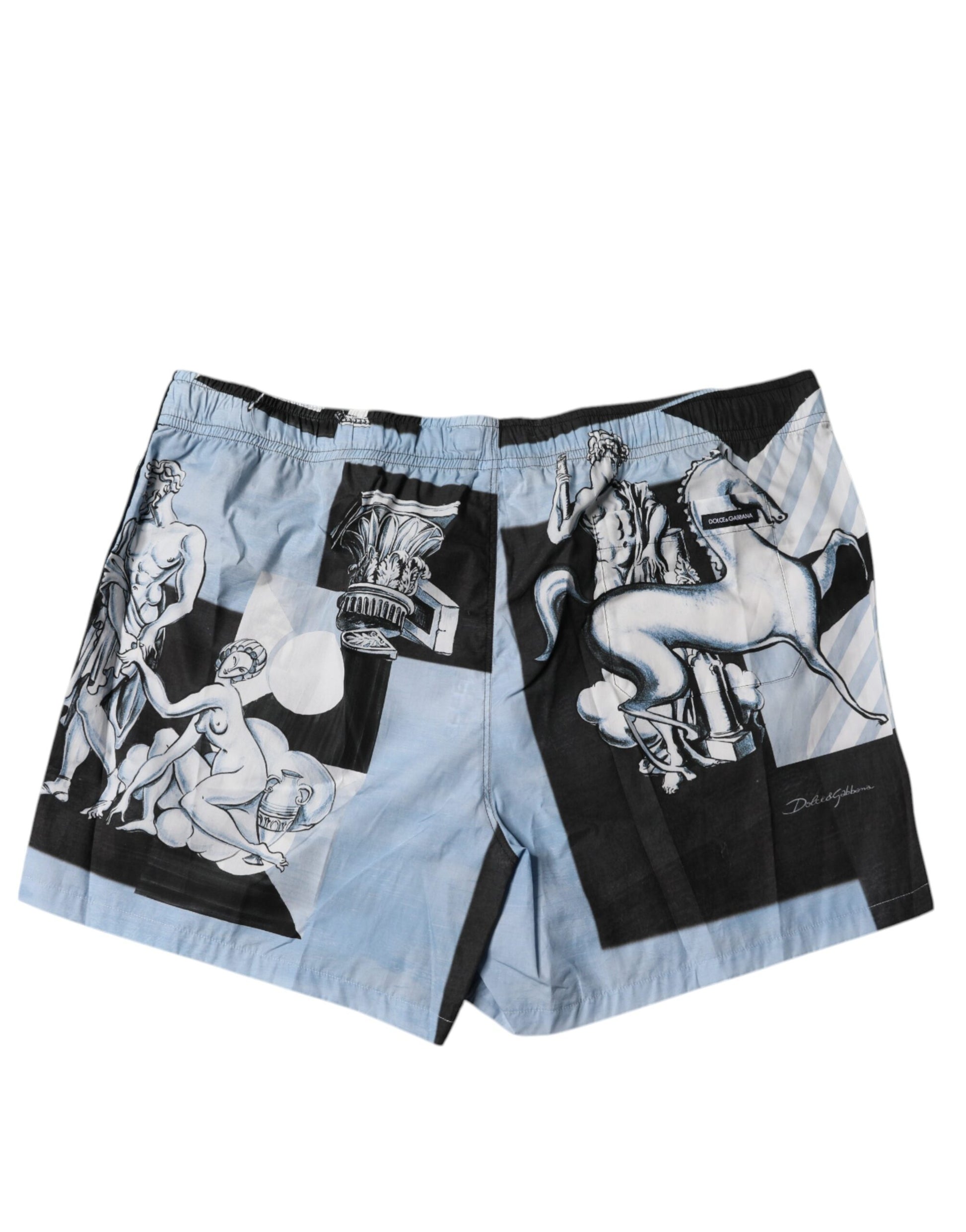A pair of blue cotton shorts with a statue print, featuring classical artwork on the legs