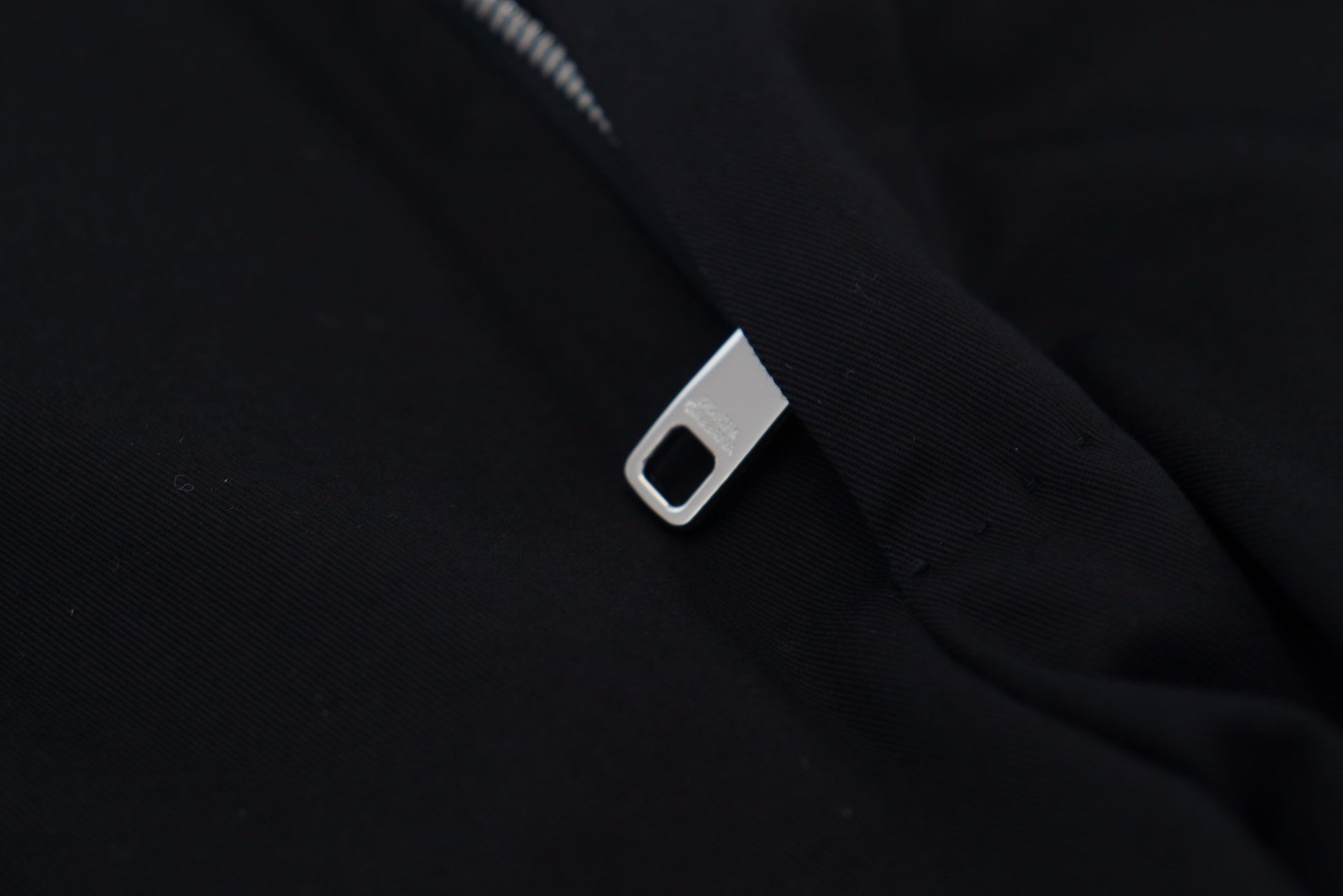 Zipper on black fabric