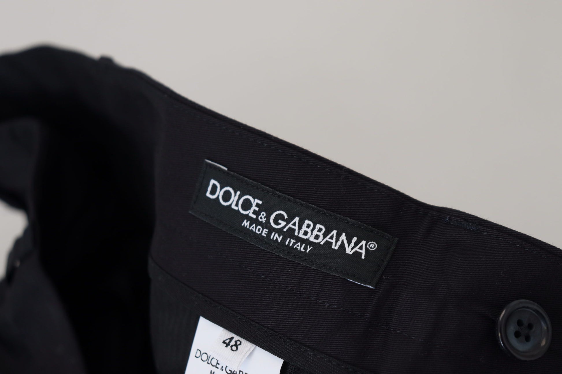 Black shirt with white label on front