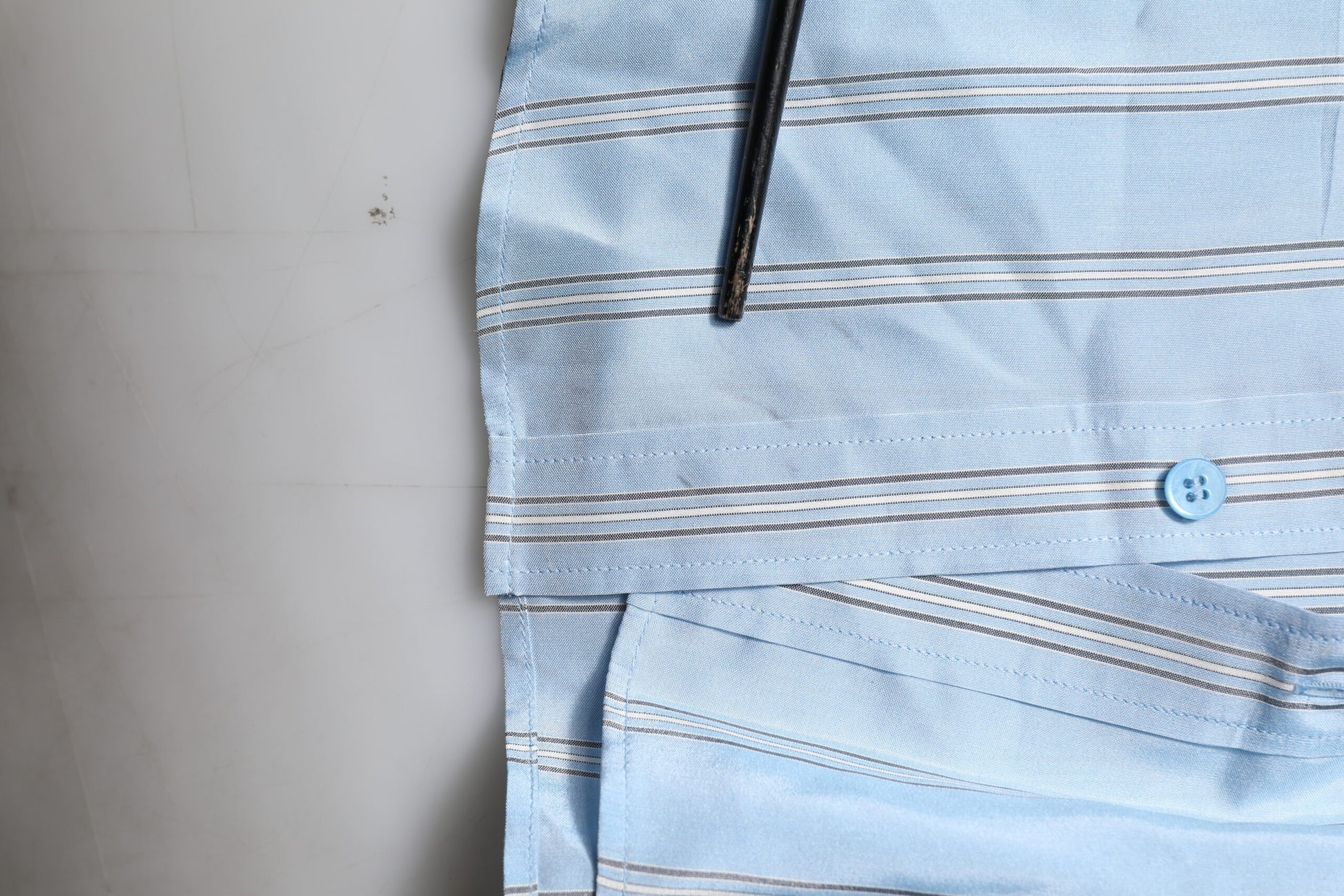 A blue striped dress shirt with long sleeves from the brand Dolce & Gabbana
