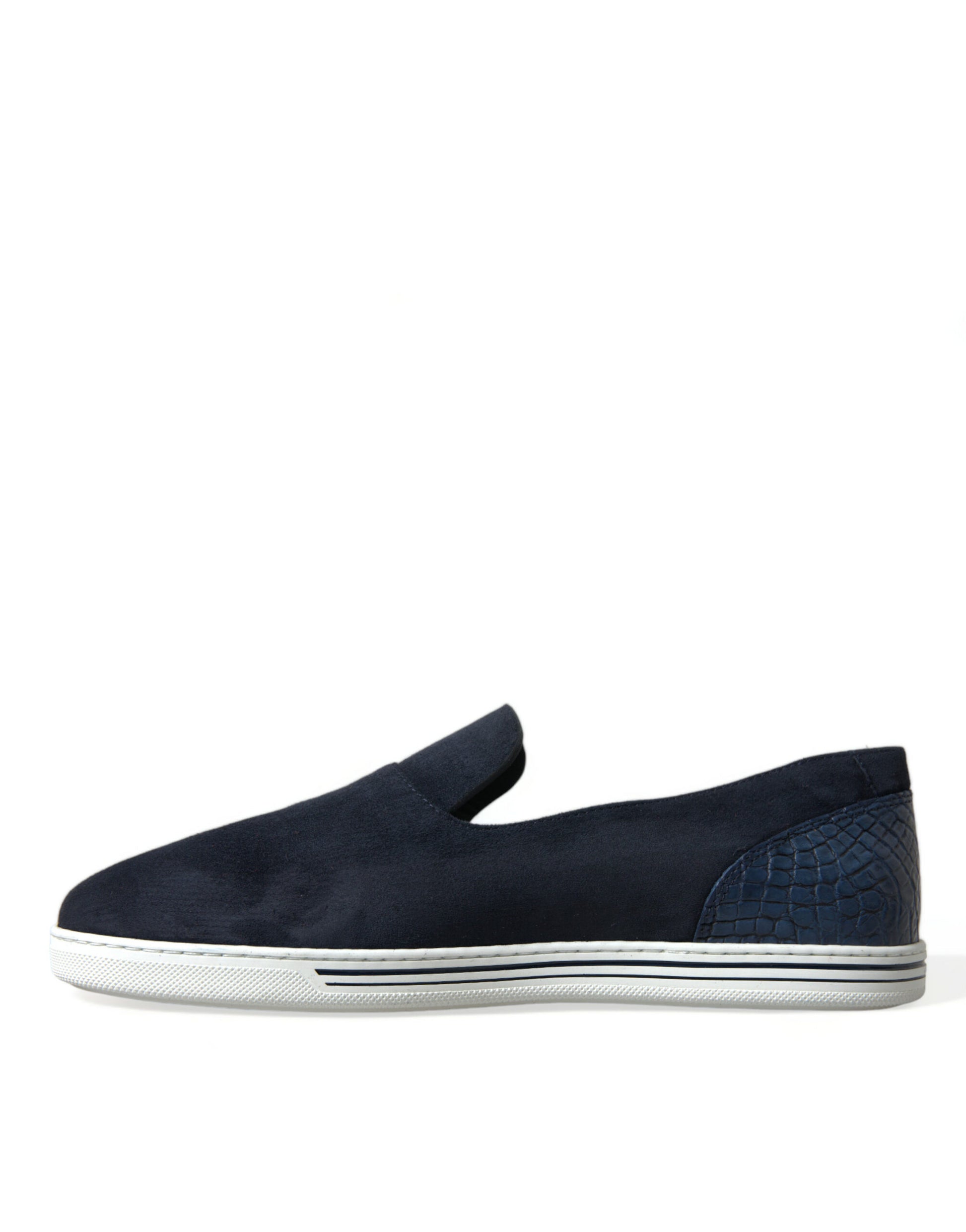 Pair of black slip on shoes with white sole