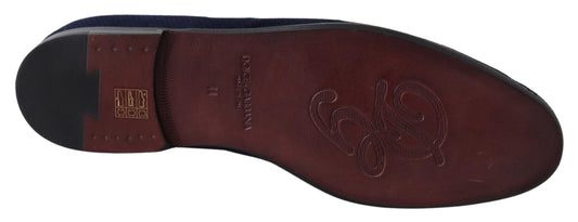 Pair of brown leather dress shoes with laces and a label on the tongue