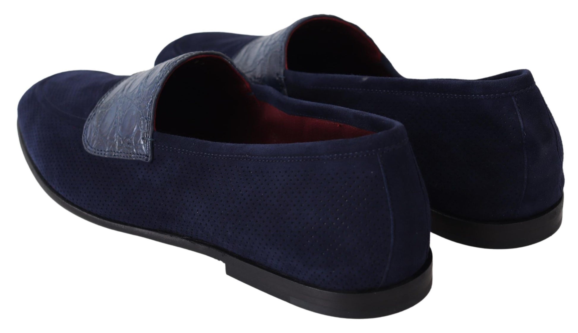 Pair of blue suede loafers with red lining and silver buckles