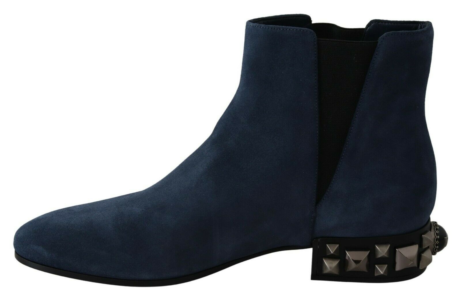 Pair of blue suede boots with zipper detail and spiked heel