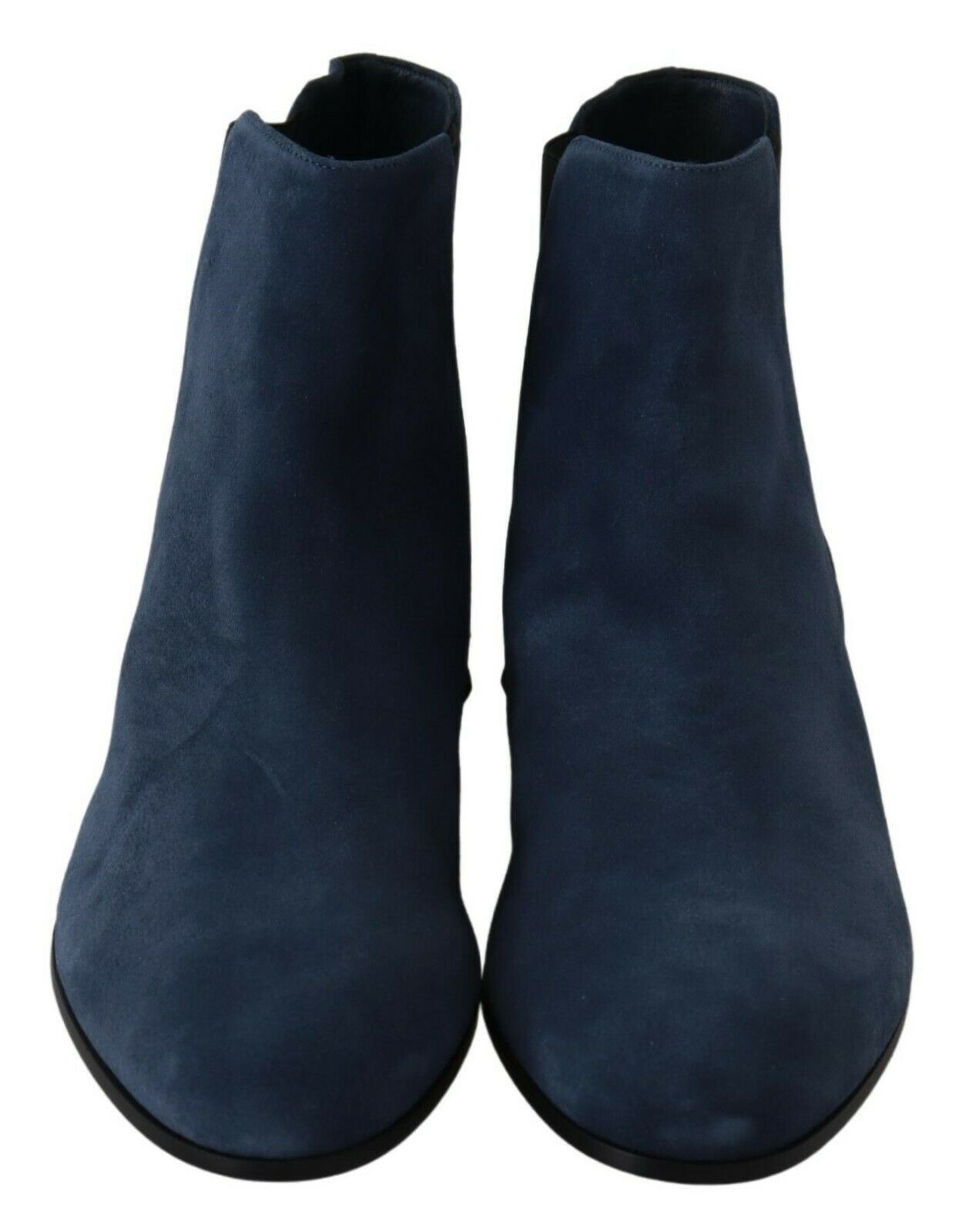 Pair of dark blue suede boots with elastic panels and a slight heel