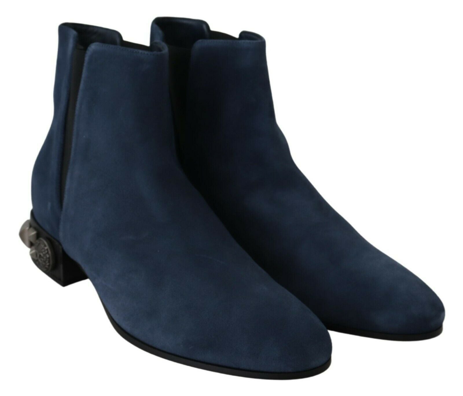 Pair of blue suede boots with black laces and heels
