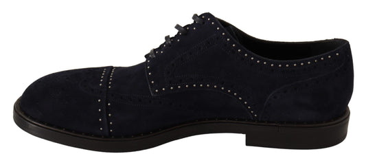 Pair of black dress shoes with laces and decorative stitching