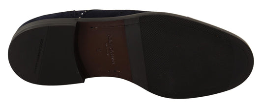 Pair of black shoes with white soles