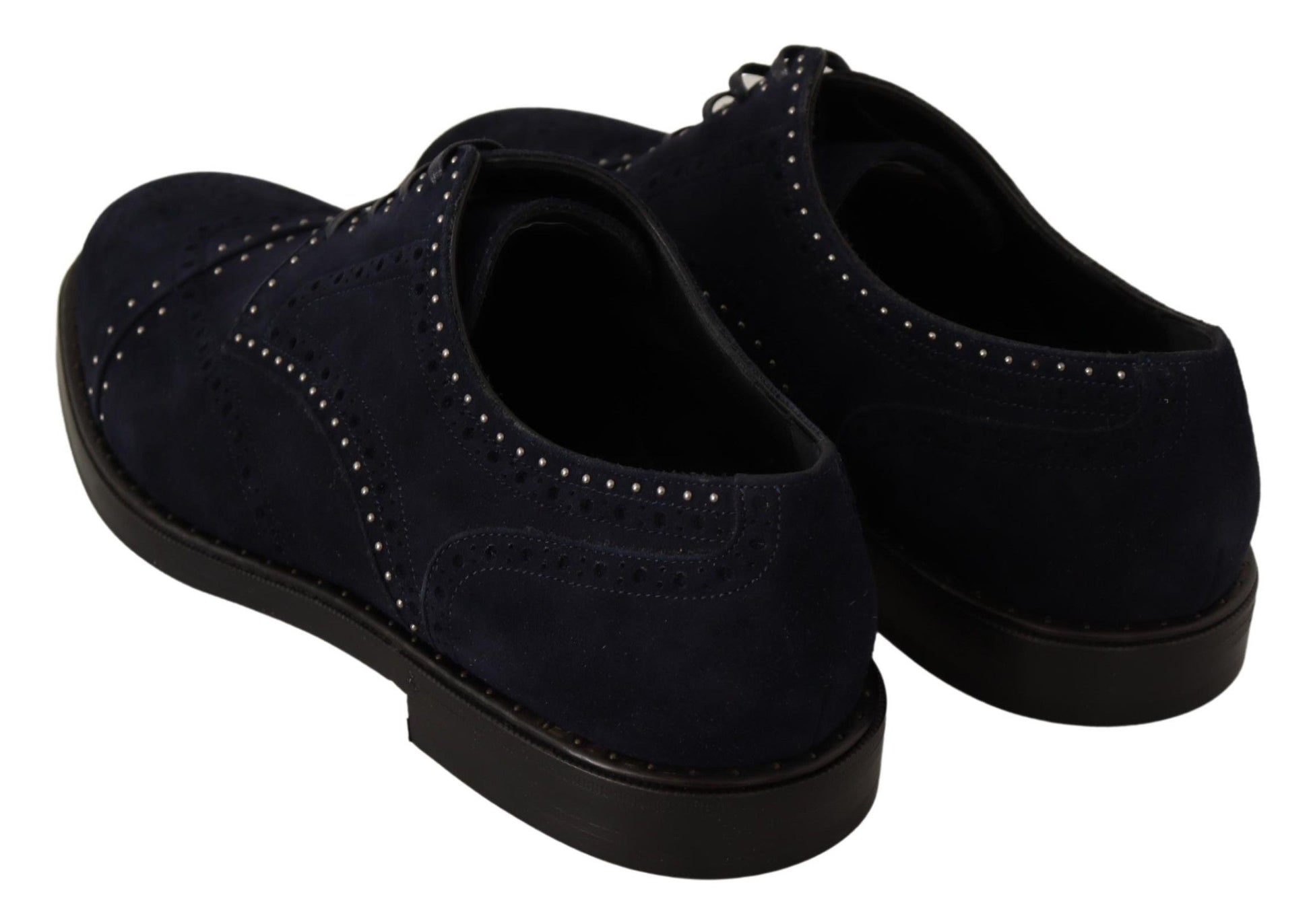 Pair of dark blue suede shoes with studded details and black soles