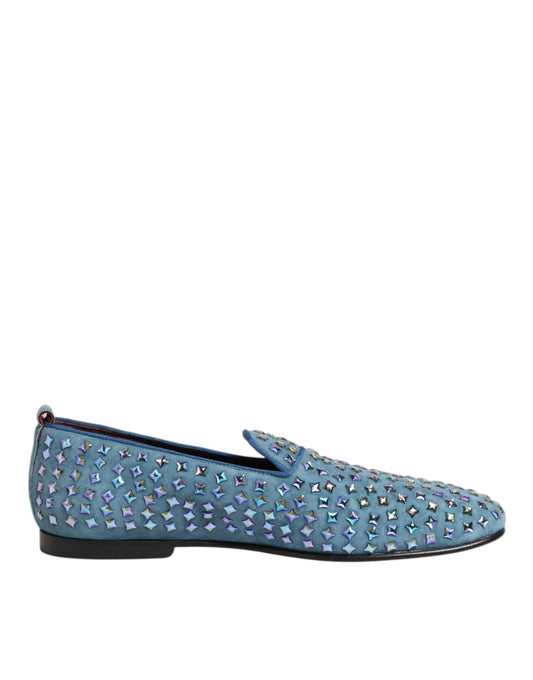 A pair of blue suede loafers with studs, designed by Dolce & Gabbana