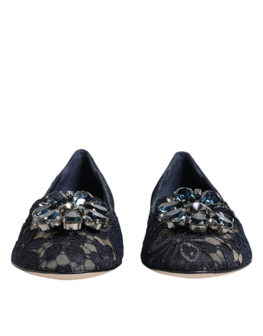 Pair of black shoes with embellishments on top