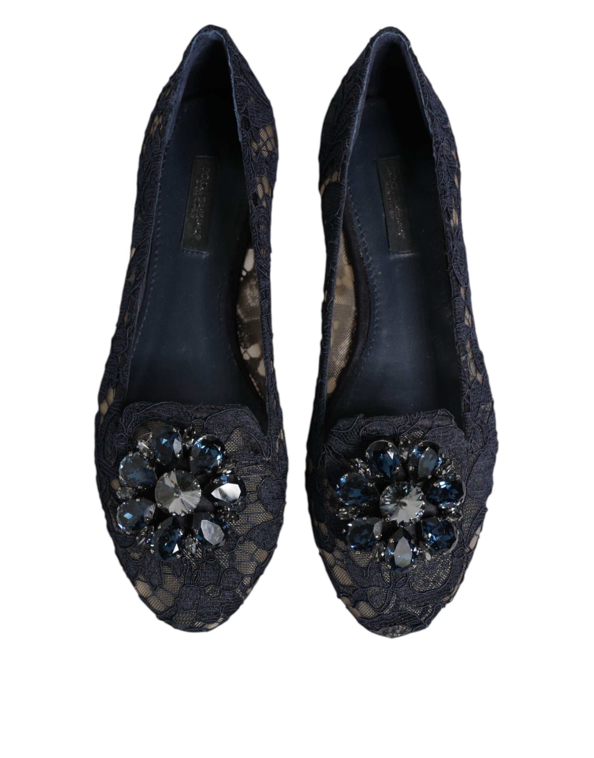Pair of women's shoes with embellishments on toe