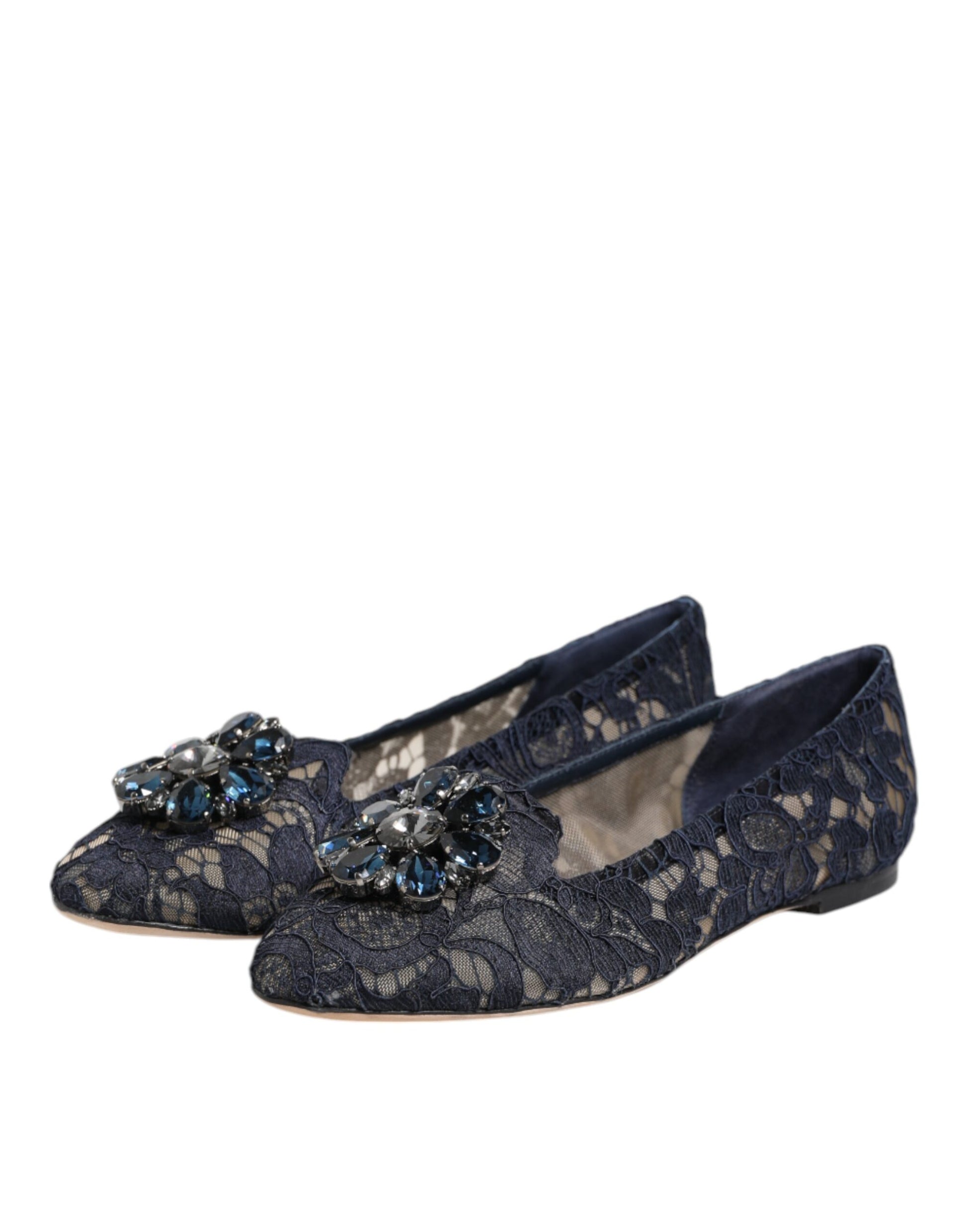 Pair of black lace shoes with embellished bow on top