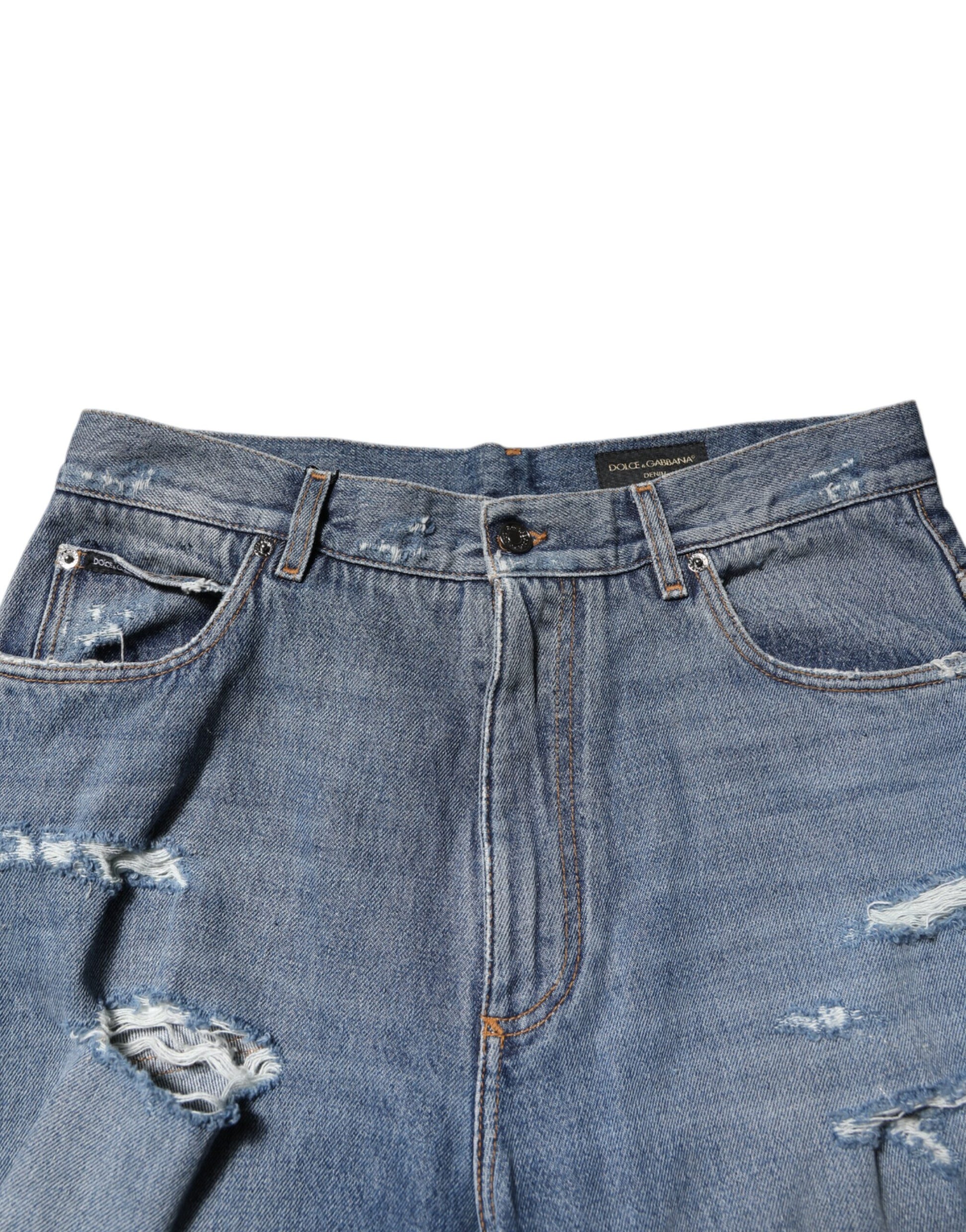 Blue denim jeans with distressed details