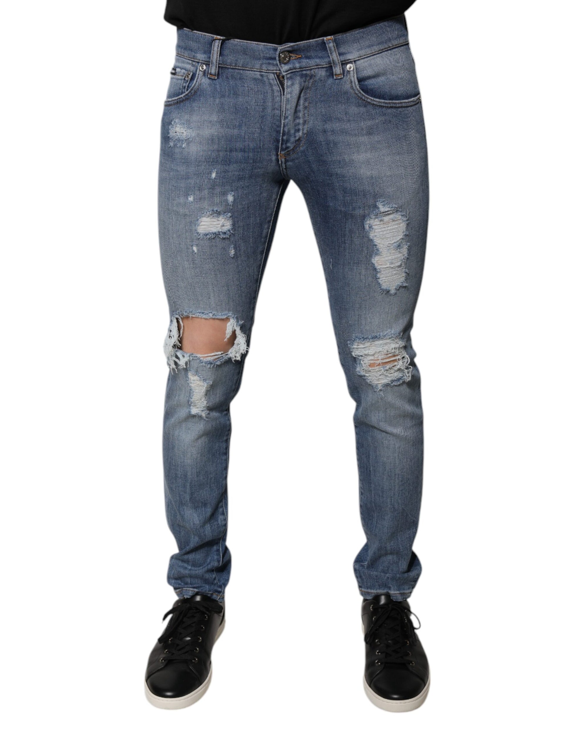 Pair of blue jeans with distressed details