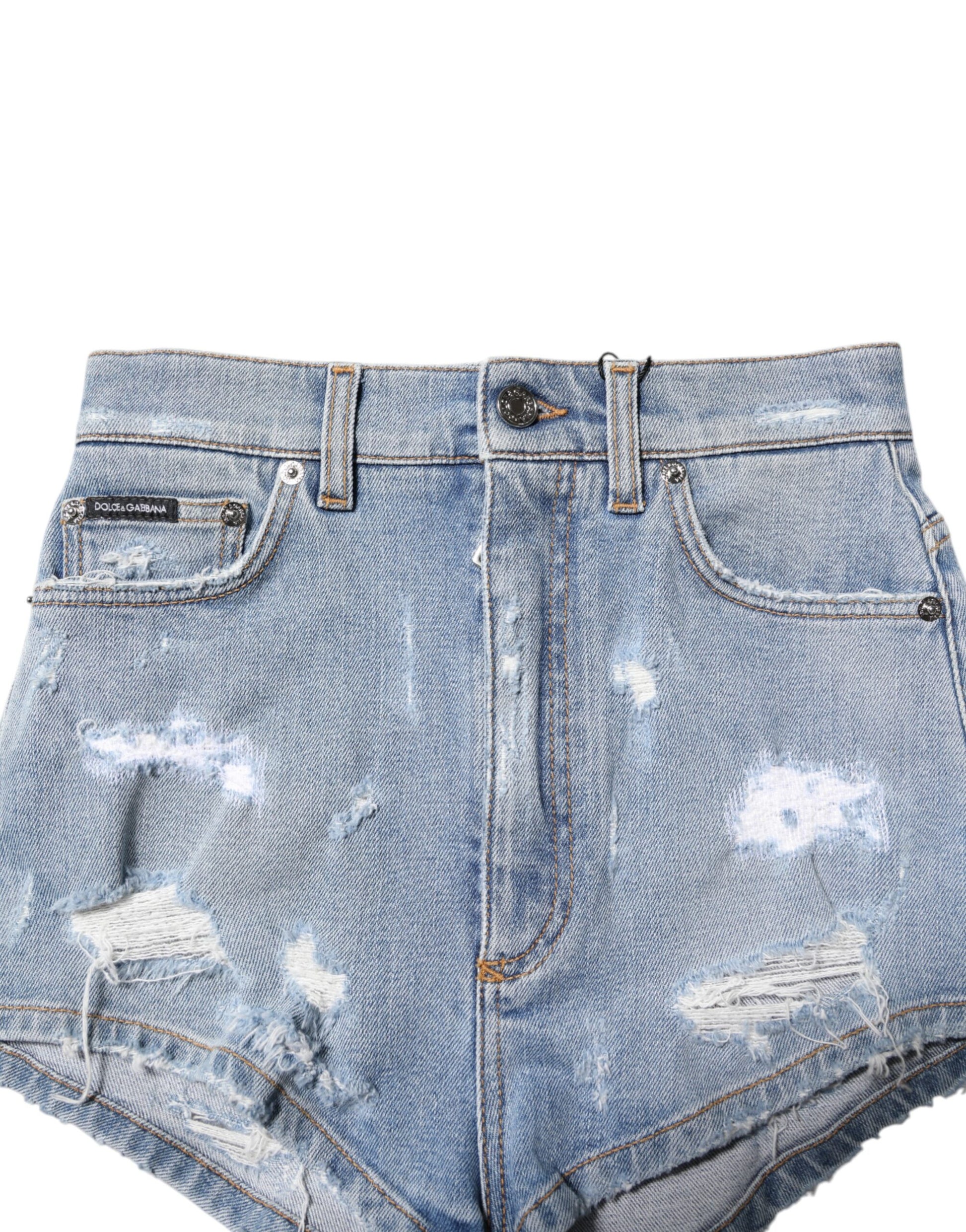 Blue denim shorts with distressed design