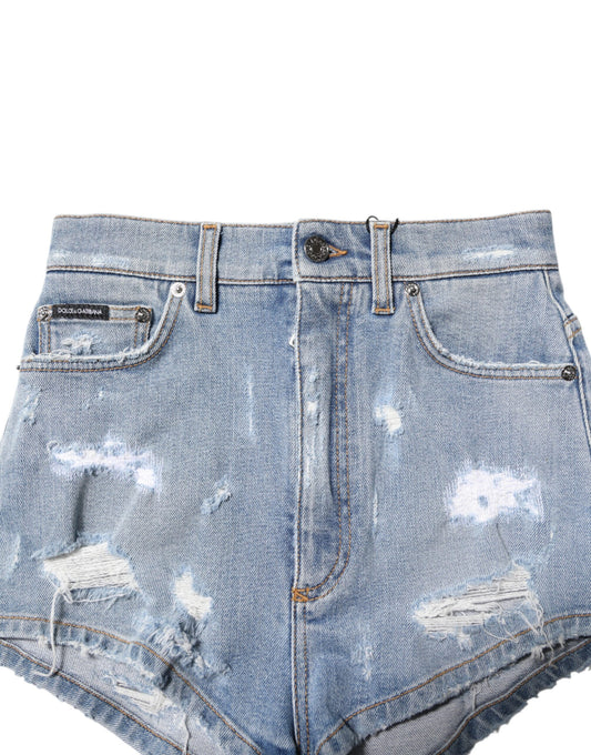Blue denim shorts with distressed design
