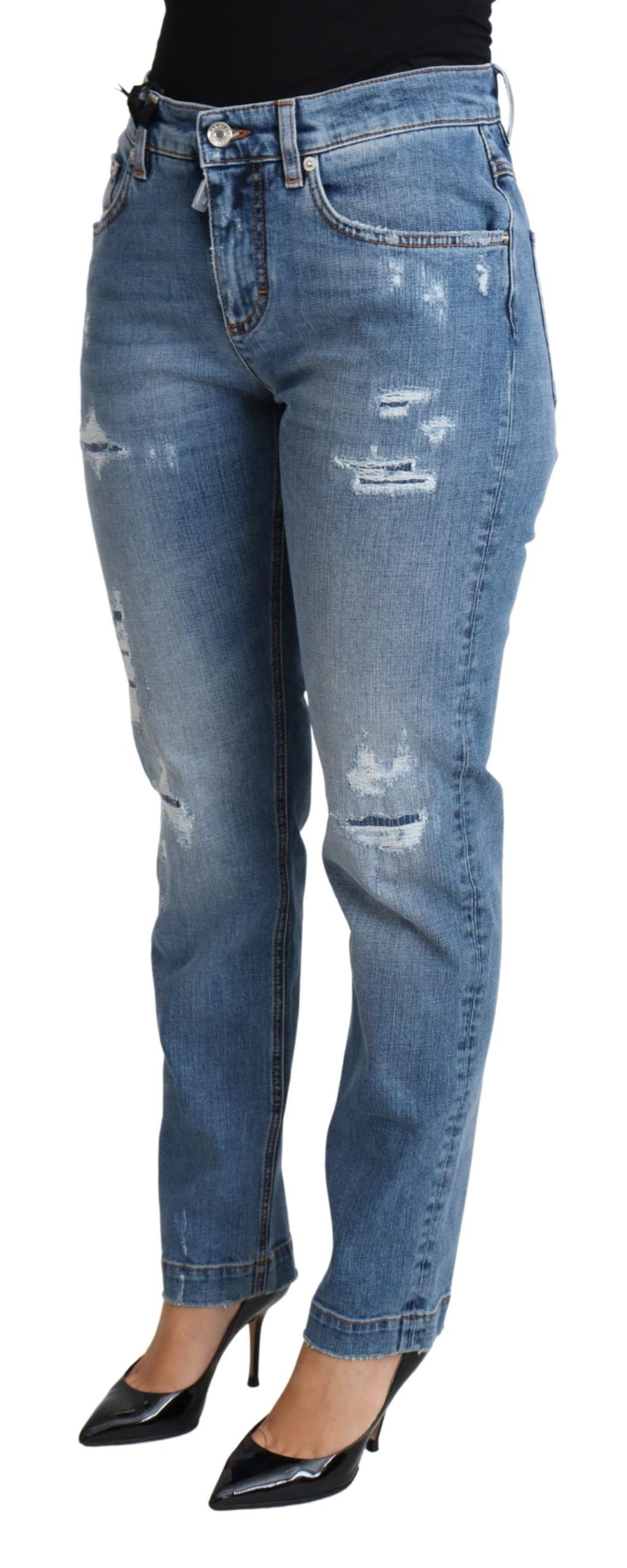 Pair of women's jeans with distressed design
