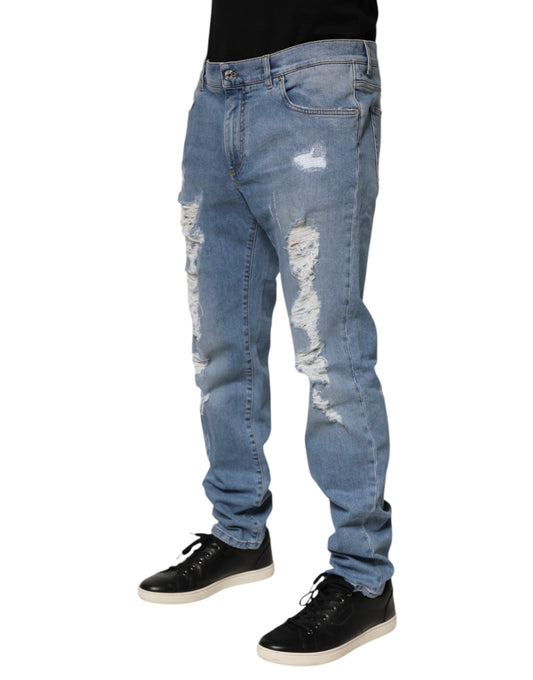 Man wearing blue jeans and black shoes