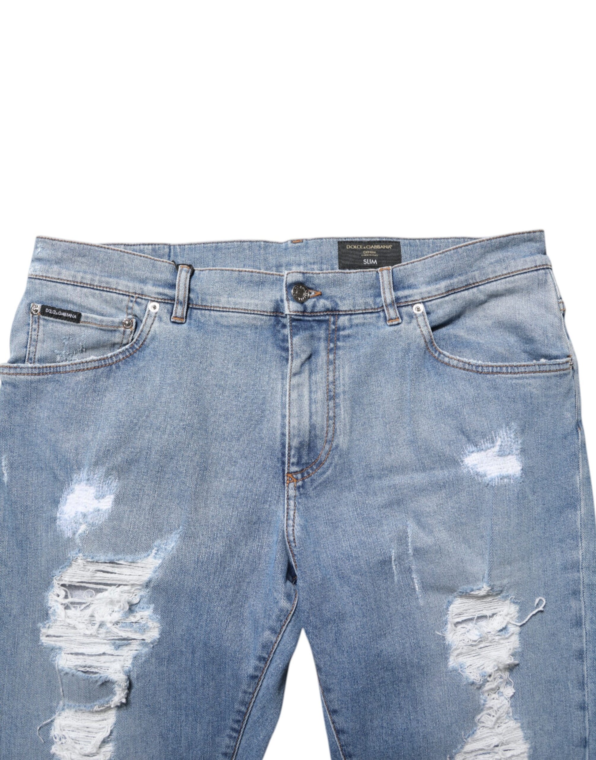 Pair of distressed denim jeans
