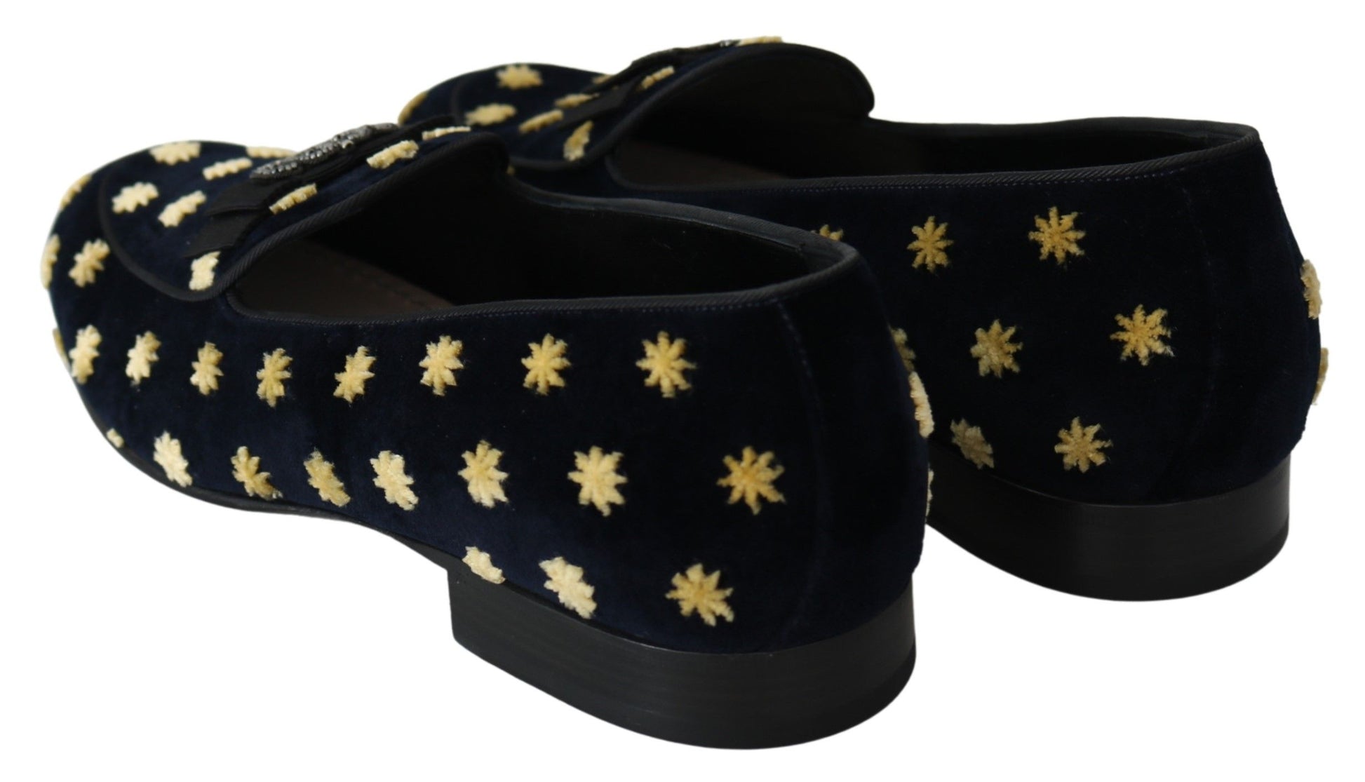 Pair of black velvet shoes with gold star embroidery and heels