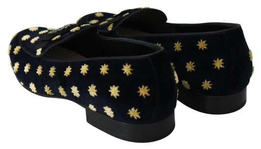 Pair of black velvet shoes with gold star embroidery and heels