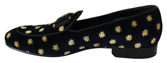 Pair of black velvet shoes with gold star embroidery