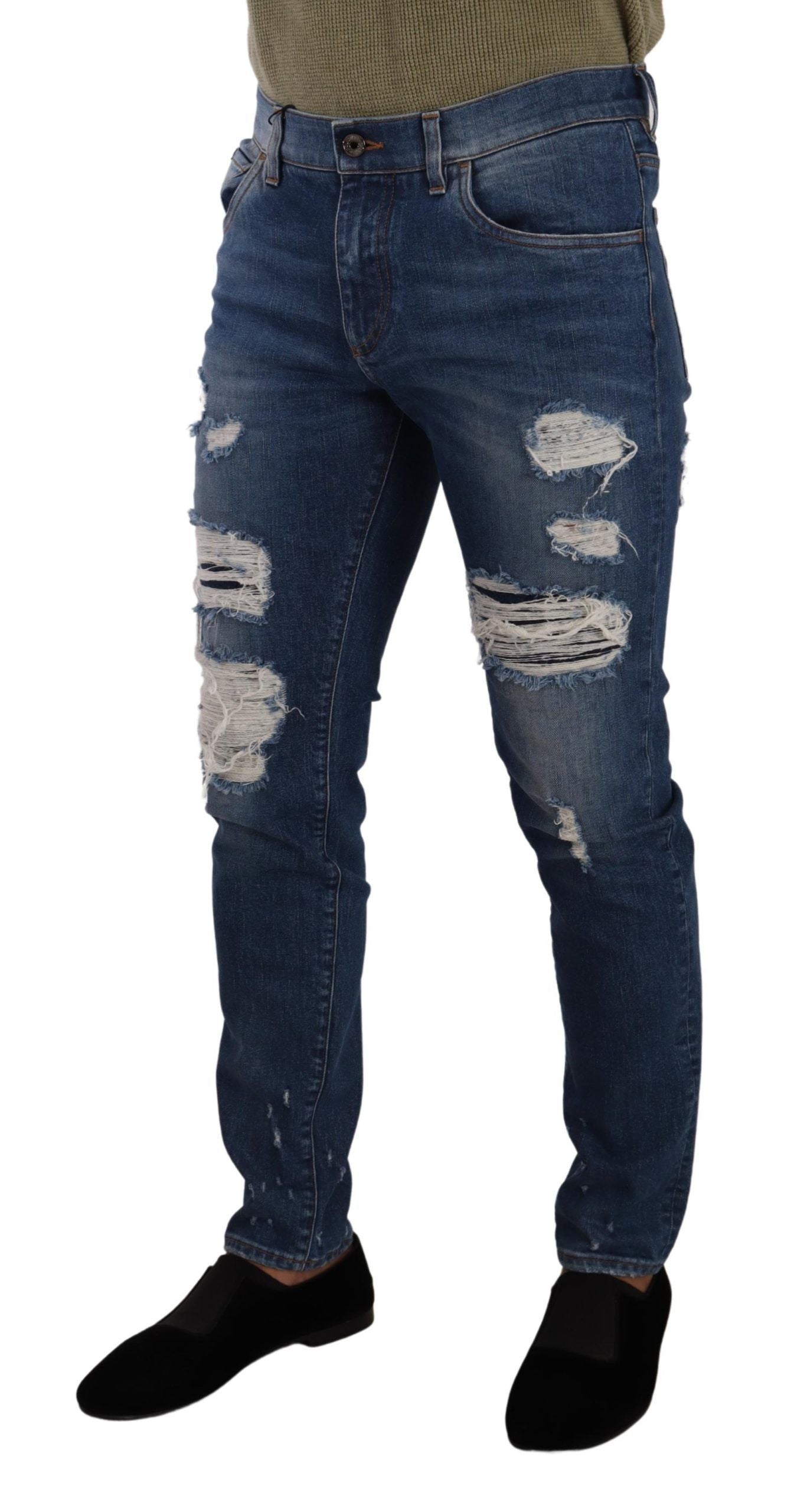 Pair of blue denim jeans with distressed details